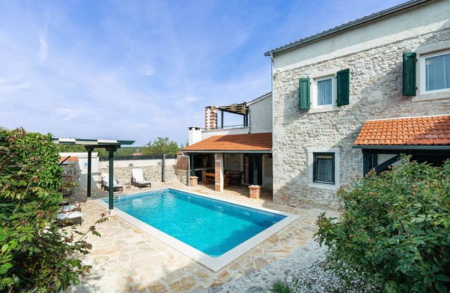 Stone Villa Mia with a big pool
