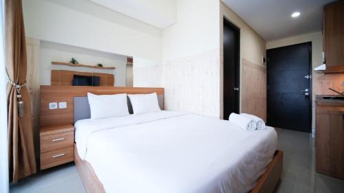 Strategic and Homey Studio at Tamasari Papilio Apartment By Travelio