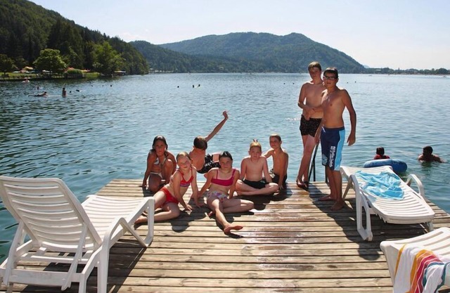 Sunny holiday apartment on Lake Klopeiner with balcony and private beach