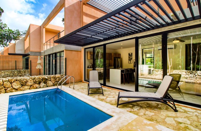 Sun-filled & dog-friendly resort home with outdoor pool, gym, patio, & courts