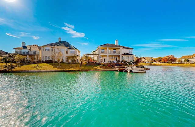 Sunlit waterfront retreat with patio, fireplace, & kayaks - near golf