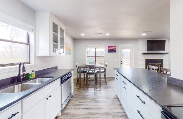 Sunny dog-friendly home in secluded neighborhood with patio, backyard