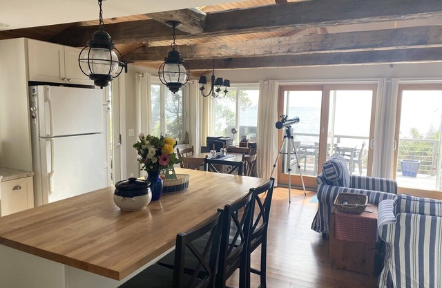 Take in the breathtaking views at our popular oceanside cottage with large deck.