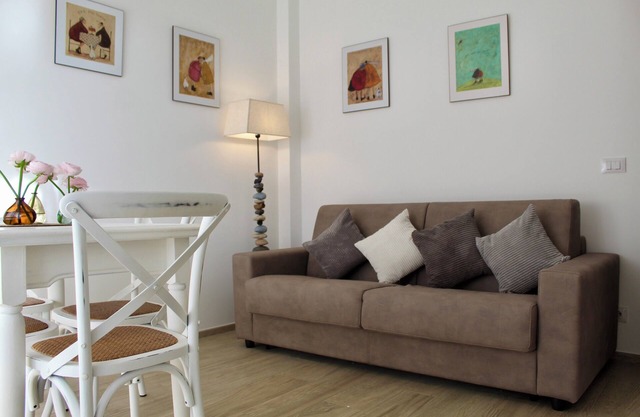 Terrace: surrounded by greenery, with large terrace overlooking the sea and private parking space,