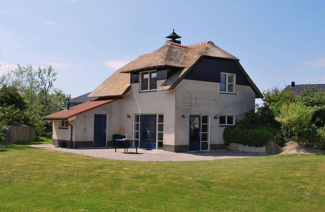 Thatched villa with bath in a holiday park