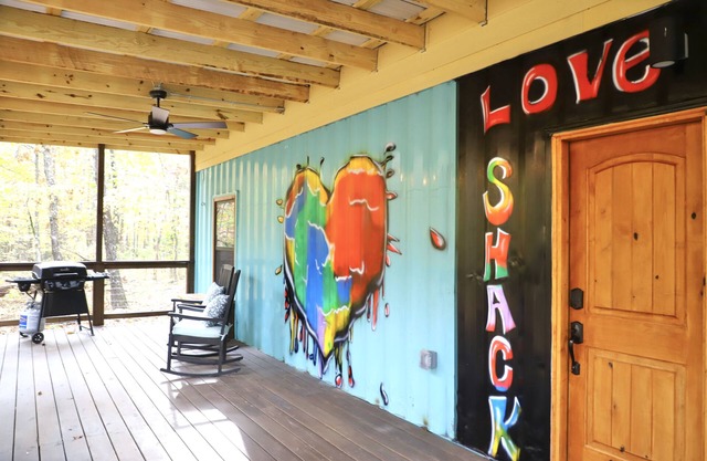 The LOVE Shack Shipping Container Tiny Home in the woods near the BNR park