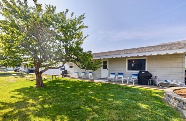 The Salty LadyBug 2BDRM condo steps from Crescent Beach. Sleeps up to six.