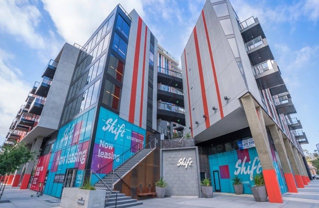 The Shift – Sleek 1BRs with rooftop pool, gym, and designer interiors.