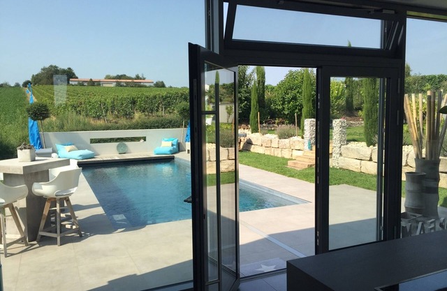 To the vintage villa with vineyards and a view of the Rhine valley