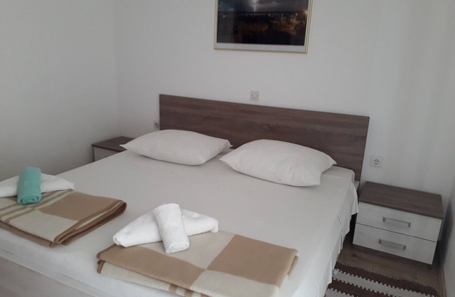 Two bedroom apartment with terrace and sea view Barbat, Rab (A-5070-b)