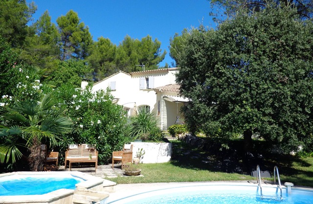 Typical and luxurious house in the very heart of provence with swimming pool .