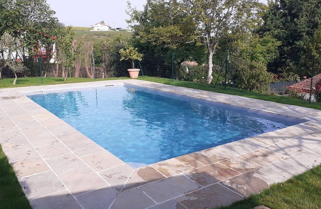 Typical Basque house with swimming pool near sea, lake and mountain