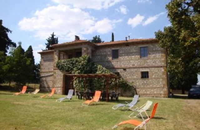 Typical Tuscan Villa between wineyards and olive trees