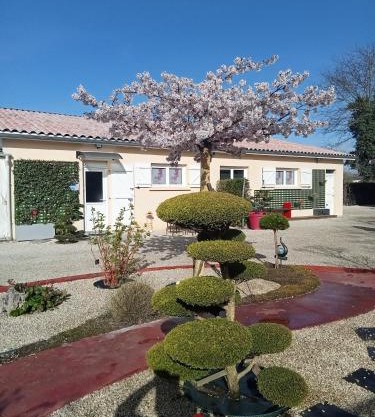 une pause quelque part au jardin des érables et des niwakis