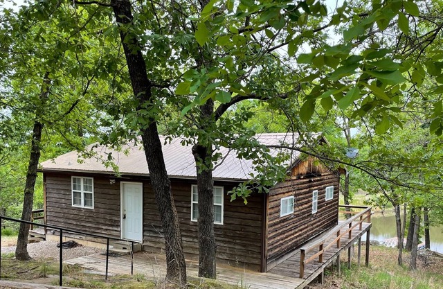 Unique Cabin with Pond away in the woods