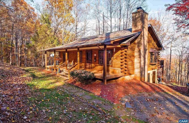Unwind in Seclusion: Log Cabin Retreat with Wood Burning Stove & Game Table