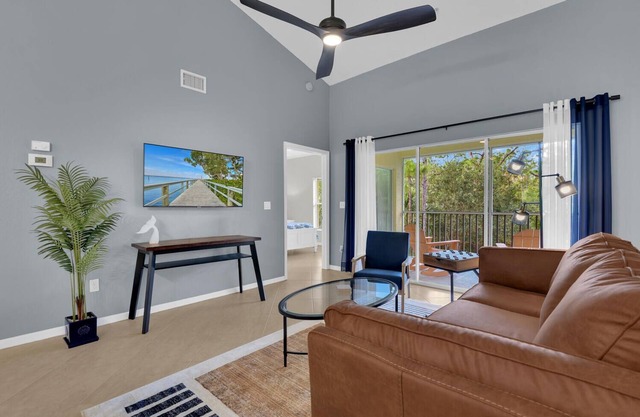 Updated modern 3rd floor Lely Resort condo overlooking tropical preserve!