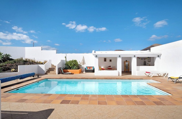 Vacation Home "Casa Sol y Mar Tías" with Sea View, Shared Pool & Wi-Fi
