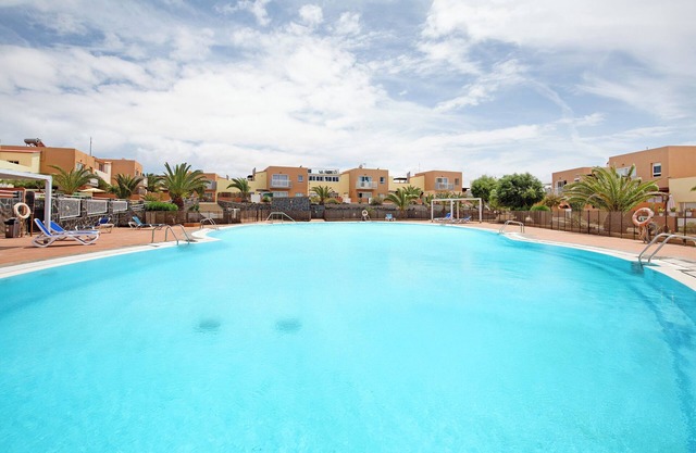 Vacation Home "Las Fuentes Corralejo" with Mountain View, Shared Pool & Wi-Fi