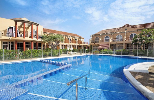Vacation Home 'Sunrise Maspalomas' with Mountain View, Shared Pool & Wi-Fi