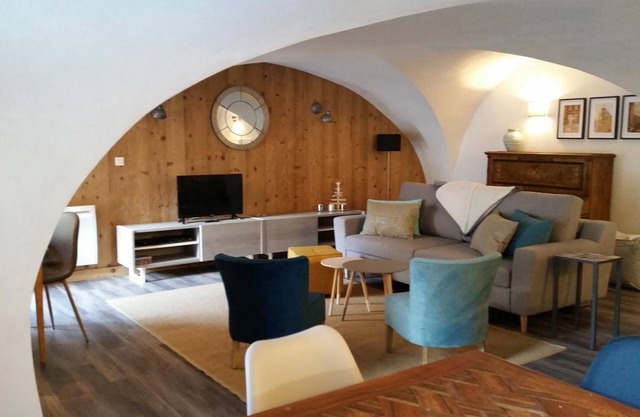 Vaulted two-bedroom apartment with sunny terrace