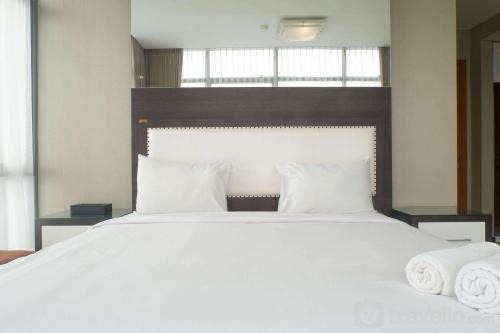 Vibrant Luxurious 2BR Apartment at Aryaduta Residence Connected to Cito Mall By Travelio