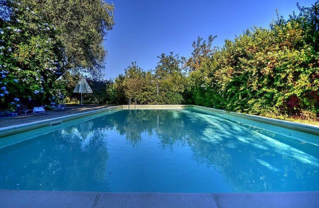 Villa Calesse A: A characteristic and welcoming independent house surrounded by meadows and by green hills, with Free WI-FI.