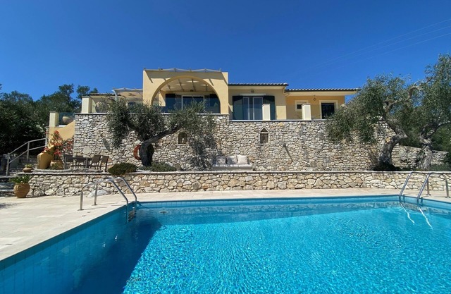 Villa Rosemary - 2 bed villa with infinity pool, extensive terraces & sea view.