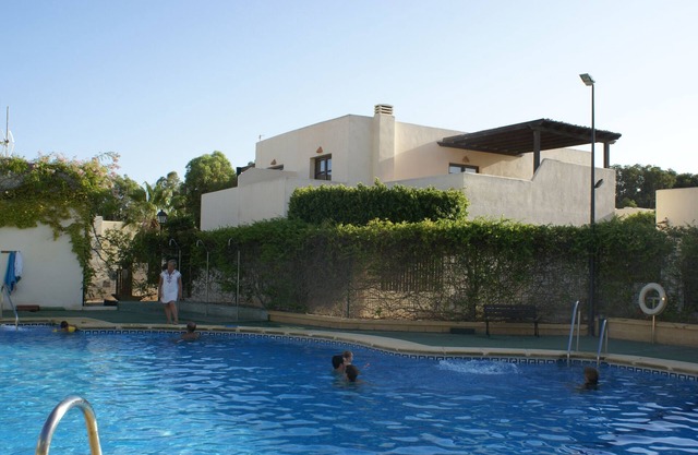 Villa, with pool in gated community very close to the beach and the town