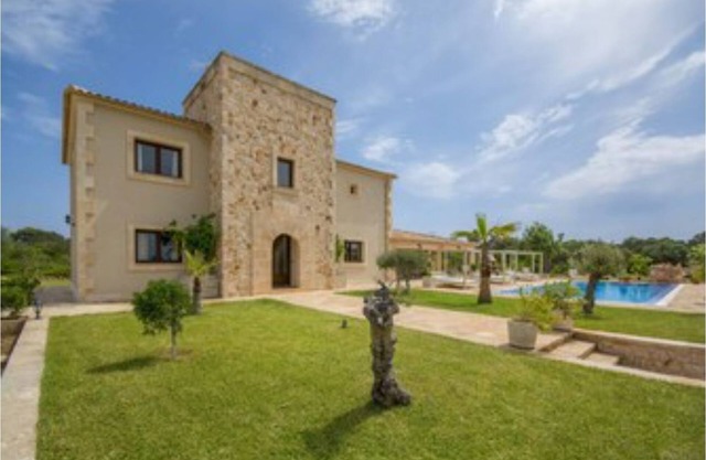 Villa with pool in front of Es Trenc