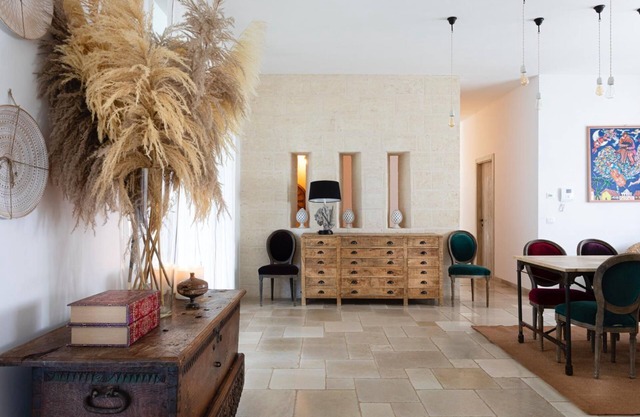 Villa with pool nestled in the typical Apulian landscape, between olive groves and the sea