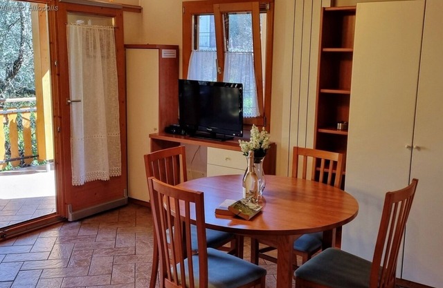 Villaggio Heliopolis Cottage 84 with terrace 2 minutes from the lake