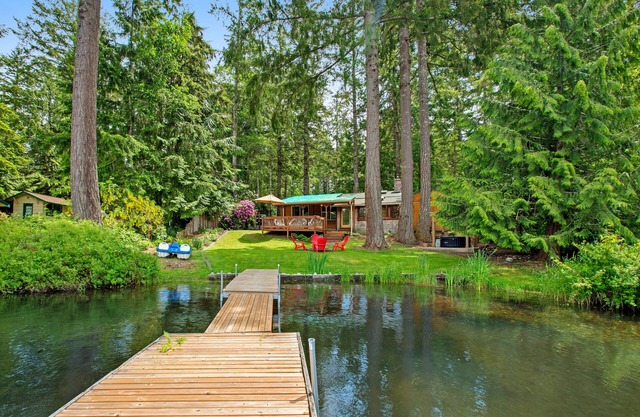Vintage Mid-Century Modern Lakefront Log Cabin