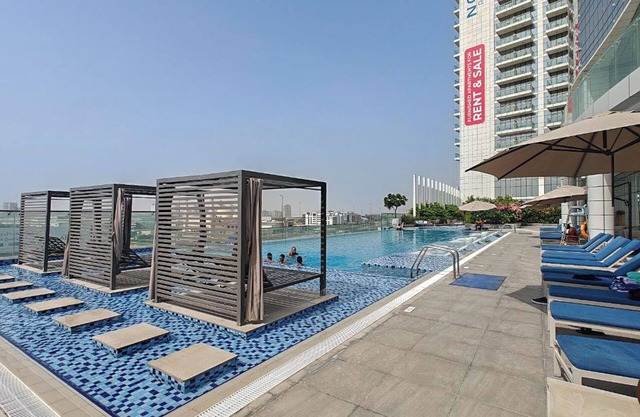 Vogue JVT Novotel Balcony Pool & Gym
