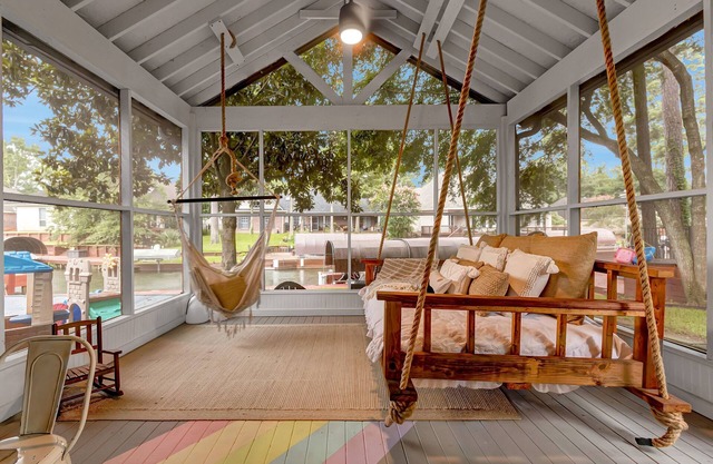 Waterfront Home on Lake Conroe with a private dock and covered boat lift.