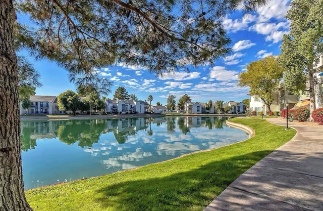 Waterfront view~Heated pools/spas~Pickleball/Tennis~Gym~Gated~BBQ~Eateries~Shops