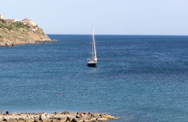 Wind House in front of Salivoli beach and the marina