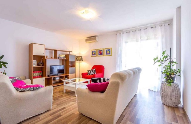 with balcony and air conditioning