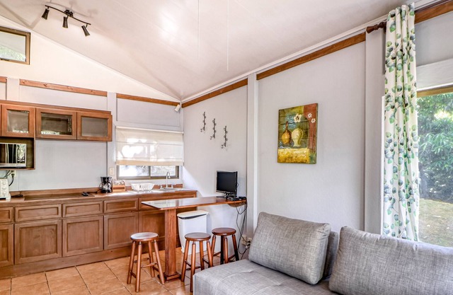 Wonderful ground-level cabin with gardens, terrace, and shared pool!