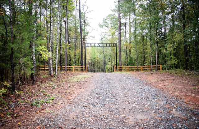 Wooded 83-Acre Estate with 4-bedroom Home, Pond, Creek, and Walking Trails