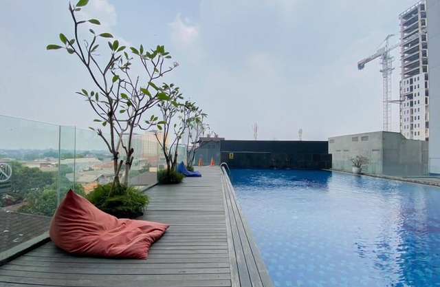 Wooden Nest 2Br Without Living Room At Evenciio Margonda Apartment