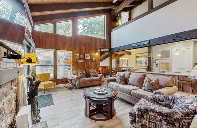 Your next vacation getaway is less than 200 steps to a private beach on the lake