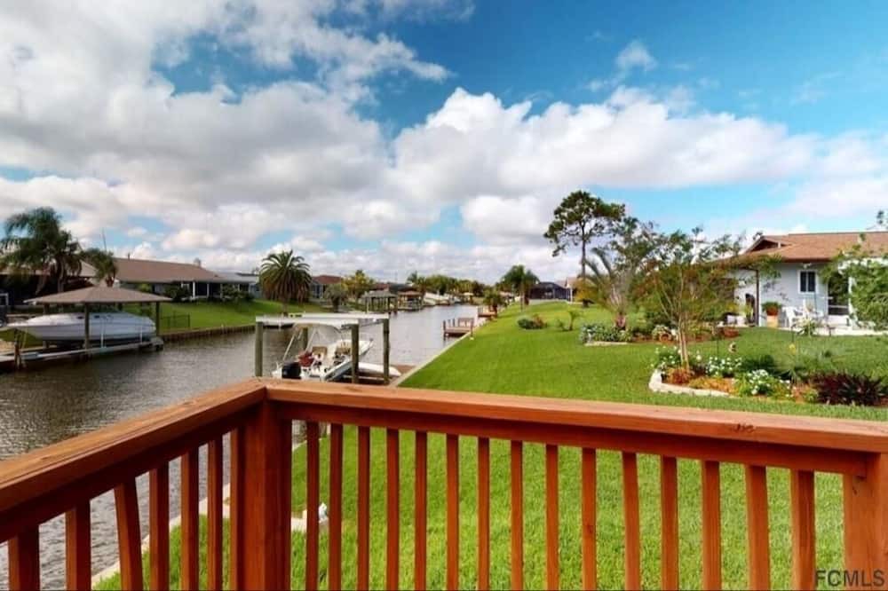 Palm Harbor House | Release and Relax swimming pool or fishing right out your back door