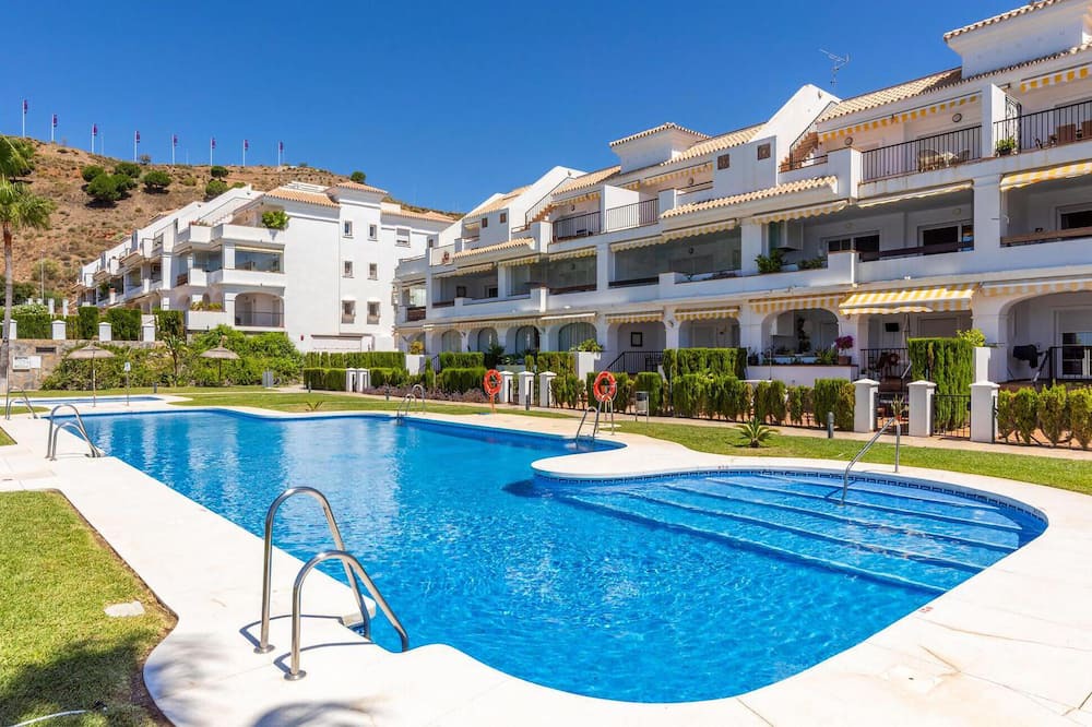 Rincon de la Victoria Apartment | Comfortable, attractively located vacation home with shared pool and panoramic sea views.