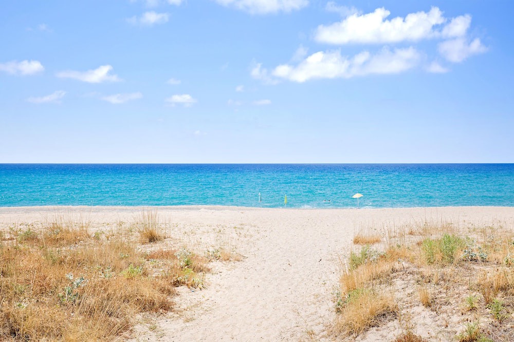 Mattinata Apartment | Enjoy a magnificent view of the sea from this vacation apartment.