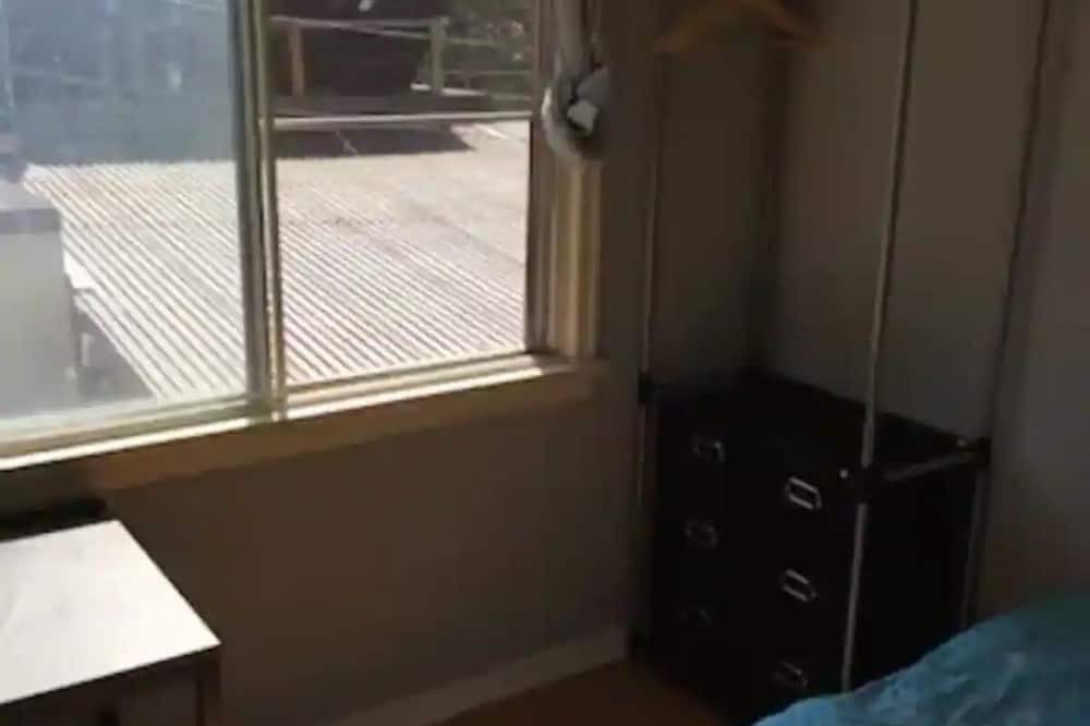 New Westminster House | Upper floor bedroom New Westminster