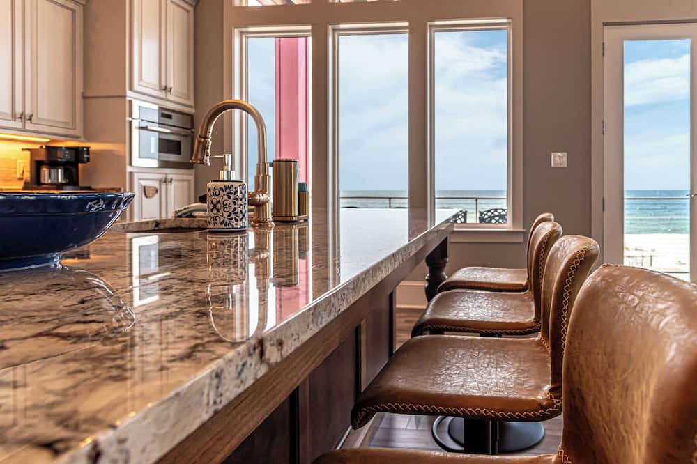 Fort Morgan House | Postcard views from your home equipped with a dream kitchen! Come enjoy luxurious living in a highly sought-after neighborhood in Fort Morgan.