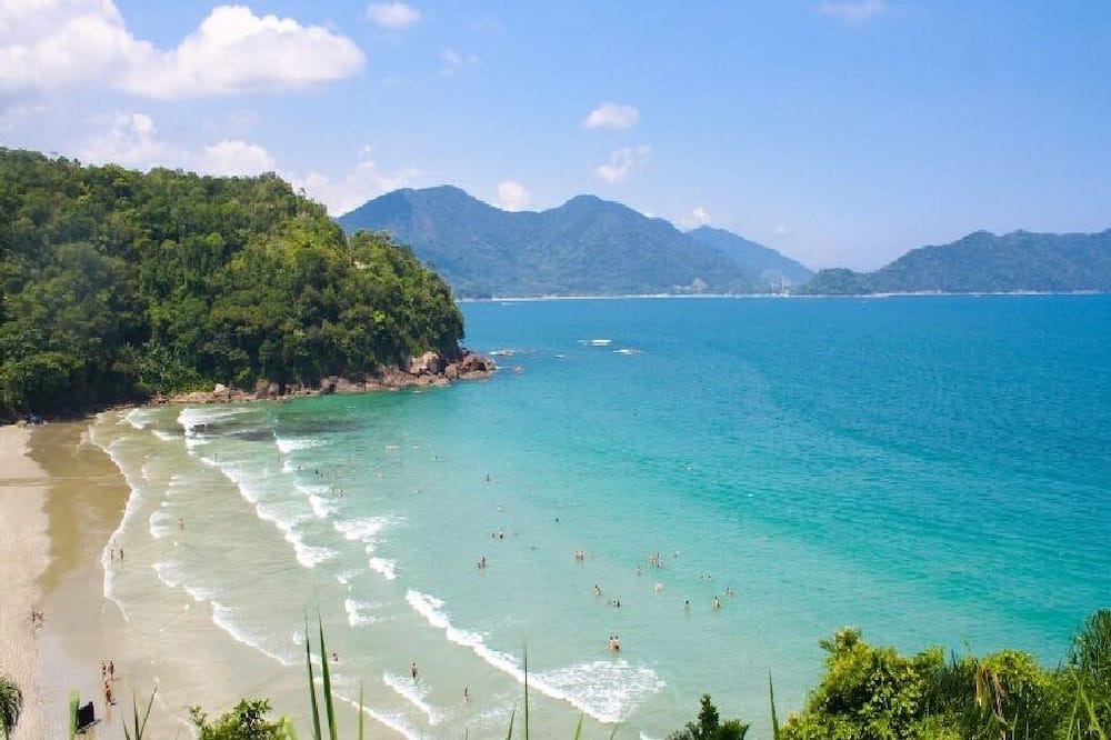 Ubatuba Condo | Enjoy nature in this cozy suite: air conditioning, Wi-Fi, TV, barbecue.manual