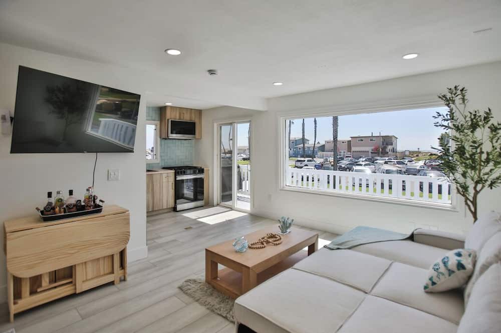 Huntington Harbour Cottage | STEPS TO PRIVATE BEACH FRONT PANORAMIC OCEAN VIEWS! Home - parking lot - sand.