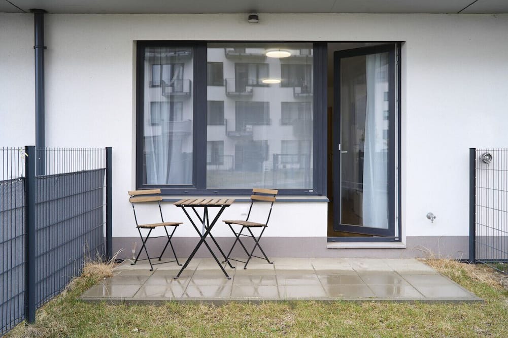Prague 9 Apartment | Garden Giggles: Ground-Floor Fun in the Sun